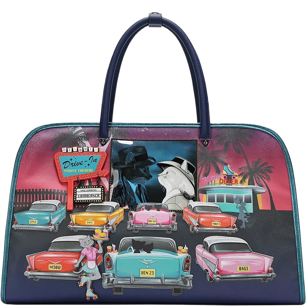 Large soft vegan leather overnight bag with two top handles and a thick soft wide detachable long strap. Adorned with cat images of casablanca playing at the drive ins. Vegan bag designed by Vendula London, available online and instore at ShoeBeDoo.