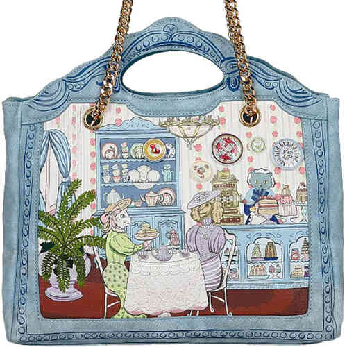 A large tote bag with cut out handles and an optional gold chain long crossbody strap, and the scene on the from is a victorian tea room with well dressed very posh cat and dog sitting at a table with cakes and tea, surrounded by pastries and ornaments. Vegan bag/accessory designed by Vendula London, available online and instore at ShoeBeDoo, official stockist in Australia