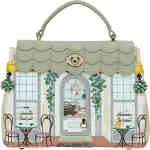 A divine day to night structured bag, a mini of the original Grace Bag - but not too mini you can't fit everything in it! You can! . The front is alight sage green shop front of divine French creperie with outdoor wrought iron chairs and tables, a door that opens tin the front and crepes galore.. Vegan bag/accessory designed by Vendula London, available online and instore at ShoeBeDoo, official stockist in Australia