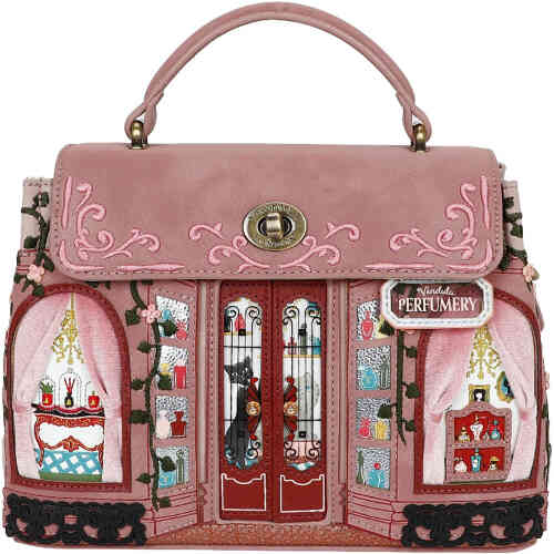 A divine day to night structured bag, a mini of the original Grace Bag - but not too mini you can't fit everything in it! You can! . The front is a dusty blush coloured shop front off an ornate French perfumery with velvet curtains on the high vine embroidered windows, and in the centre are doors that open revealing cats and divine perfume bottles. Vegan bag/accessory designed by Vendula London, available online and instore at ShoeBeDoo, official stockist in Australia