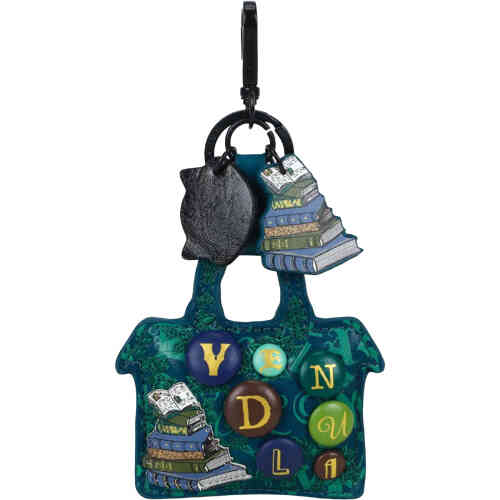 A key charm in the shape of a little house that is a rich teal blues and greens, and features a n appliquéd stack of books with typeset letters as buttons spelling Vendula. Vegan and cruelty free. ShoeBeDoo is an official stockist of Vendula London bags and wallets in Australia and New zealand