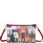 A medium sized top zip crossbody that features a traditional English street scene with The George red brick pub, a book shop and other stores in a melange of red, green and navy blue showing shops and street details. ShoeBeDoo is an official stockist of Vendula London bags and wallets in Australia and New zealand