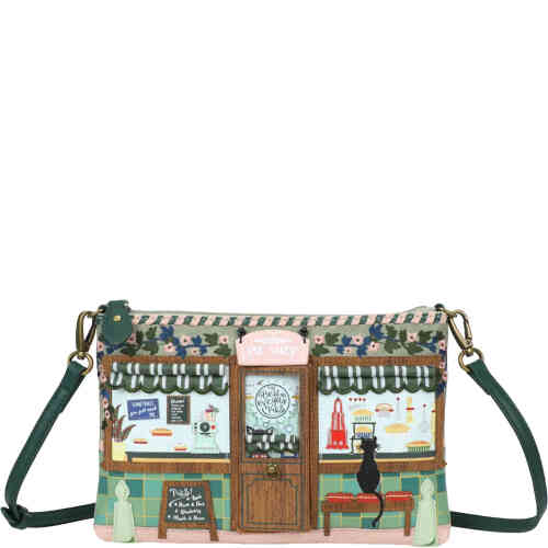 A medium sized top zip crossbody that looks like a bakery in a quaint village, with huge windows displaying appliquéd and embroidered baked treats, plus a black cat on a plush red bench seat looking in. ShoeBeDoo is an official stockist of Vendula London bags and wallets in Australia and New zealand