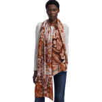 A long soft scarf from 100% viscose, made from a paisley print of rust through to burnt orange with swirls of dark cream. This is rectangular and long and able to be wrapped around you. ShoeBeDoo is an authorised stockist of Desigual in Australia and New Zealand.