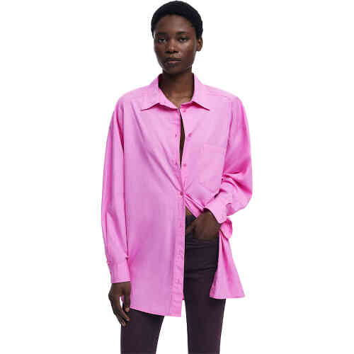 An oversized lolly pink shirt with long sleeves, a button collar, a front pocket over the left side. On the back is aw large comic book style graphic of four feminine silhouettes set into a square with Desigual graphic writing. ShoeBeDoo is an authorised stockist of Desigual in Australia and New Zealand.
