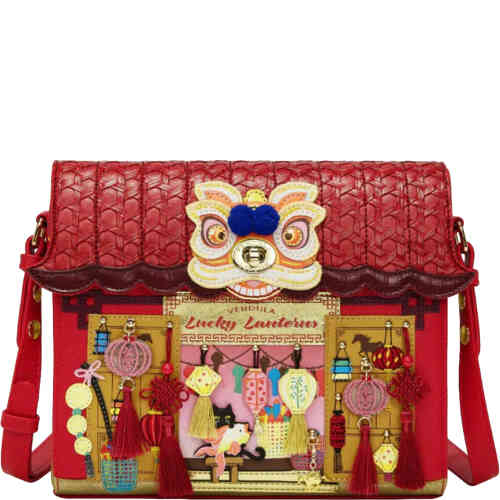 This structured postman style box bag is an absolute vision in rich red. The top is a roof which is thatched in style and opens up. The front is covered in loose attached lanterns with tassels, and a dragon head! ShoeBeDoo is an official stockist of vegan certified Vendula London Bags and Wallets in Australia and New Zealand.