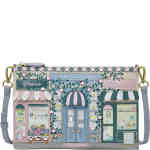 A medium sized top zip crossbody that features two canopied front shops featuring flowers in one window, and cakes in the other. ShoeBeDoo is an official stockist of Vendula London bags and wallets in Australia and New zealand