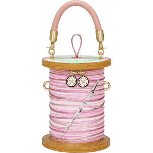 A bag that is in the shape of a cotton roll in delicious soft and shimmery pink tones. ShoeBeDoo is an authorised stockist of Vendula London Certified Vegan Leather Bags and Accessories in Australia and New Zealand.