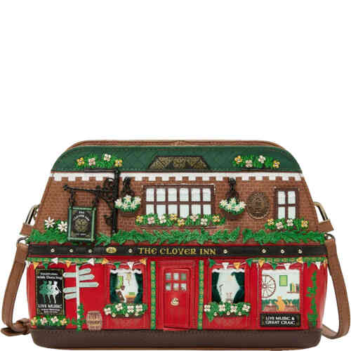 This is a slightly rounded top crossbody bag that is secure and very spacious. It is in the shape of a pub front called the Clover Inn, with two windows showing the cosy interior of the pub, a front door with doorknob that opens, velvet curtains, and lots of floral embroidery. ShoeBeDoo is an authorised stockist and retailer of Certified Vegan and Animal Friendly Vendula London Bags and Wallets in Australia and New Zealand
