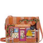 A large crossbody that features a travel shop in light and slightly darker terracotta colours. The windows feature 3D appliqué that shows travel maps, luggage, sunglasses, travel books, and even a door that opens! ShoeBeDoo is an official stockist of Vendula London bags and wallets in Australia and New zealand