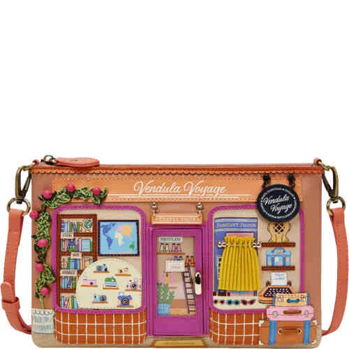 A medium sized top zip crossbody that features a travel shop in light and slightly darker terracotta colours/. The windows feature 3D appliqué that shows travel maps, luggage, sunglasses, travel books, and even a door that opens! ShoeBeDoo is an official stockist of Vendula London bags and wallets in Australia and New zealand