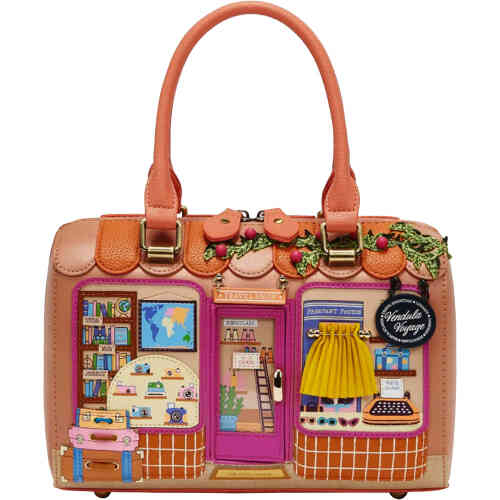 A compact mid sized bag This shop front bag from Vendula depicts a stunning canopied top adorned with embroidered vines. The embroidered vines hug the dual windows, with a door (that opens!) in the middle. Each window has 3d appliqué travel details from sunglasses to luggage, guide books and maps, and even a cheeky "passpawt" booth! ShoeBeDoo is an authorised stockist of Vendula London Certified Vegan Leather Bags and Accessories in Australia and New Zealand